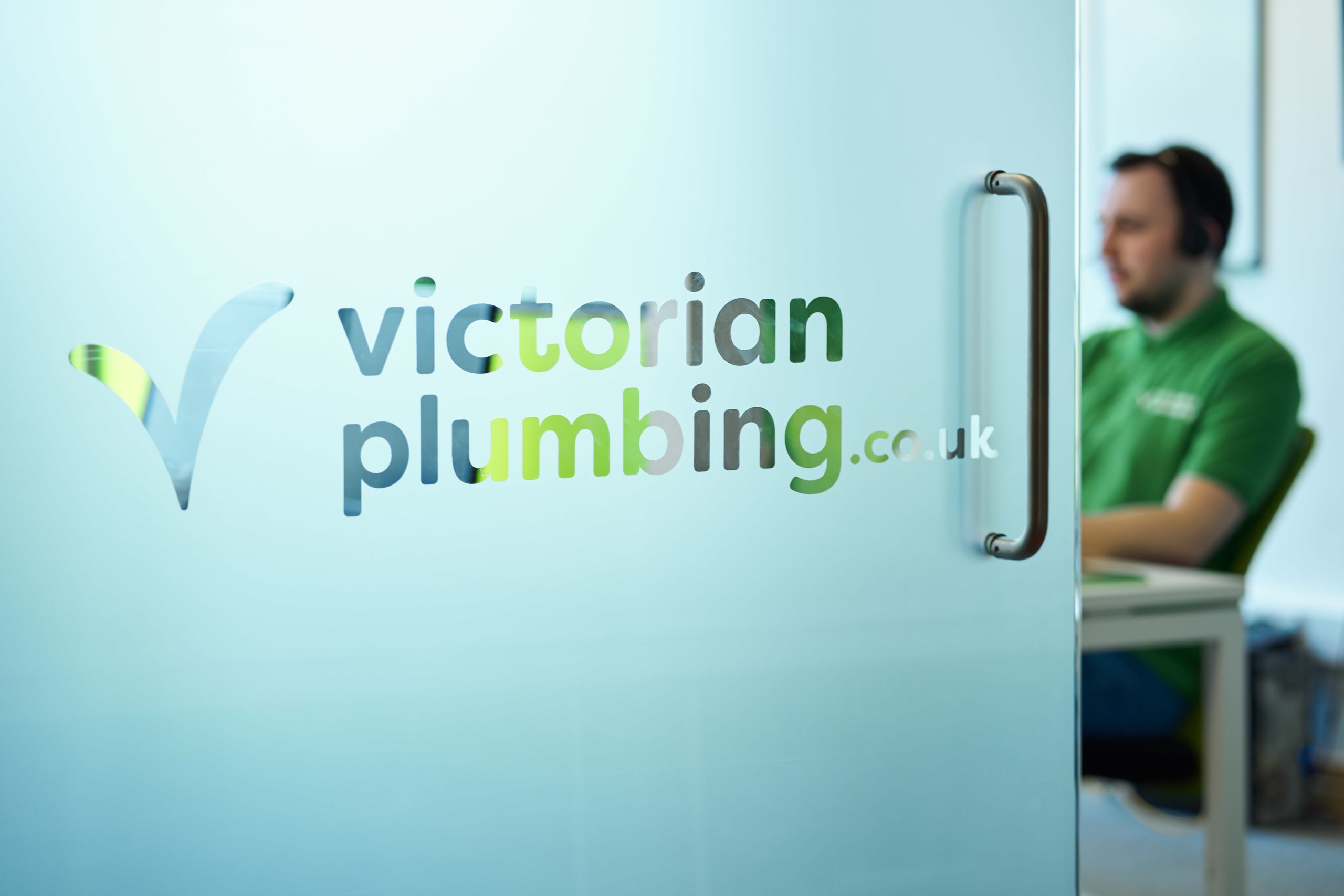 Victorian Plumbing office with callcentre worker