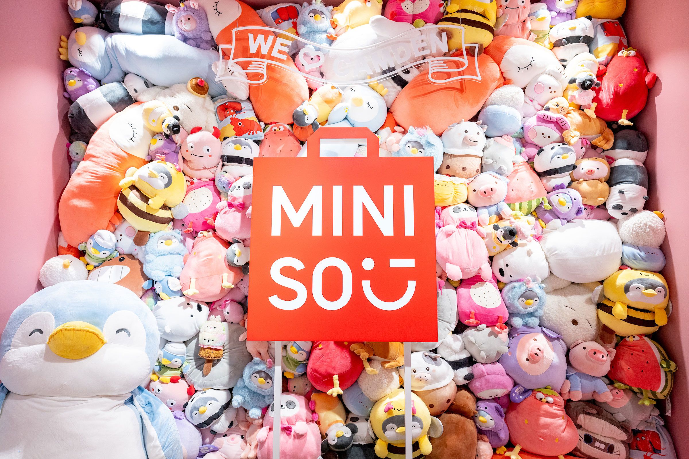 Pile of stuffed toys in Miniso store