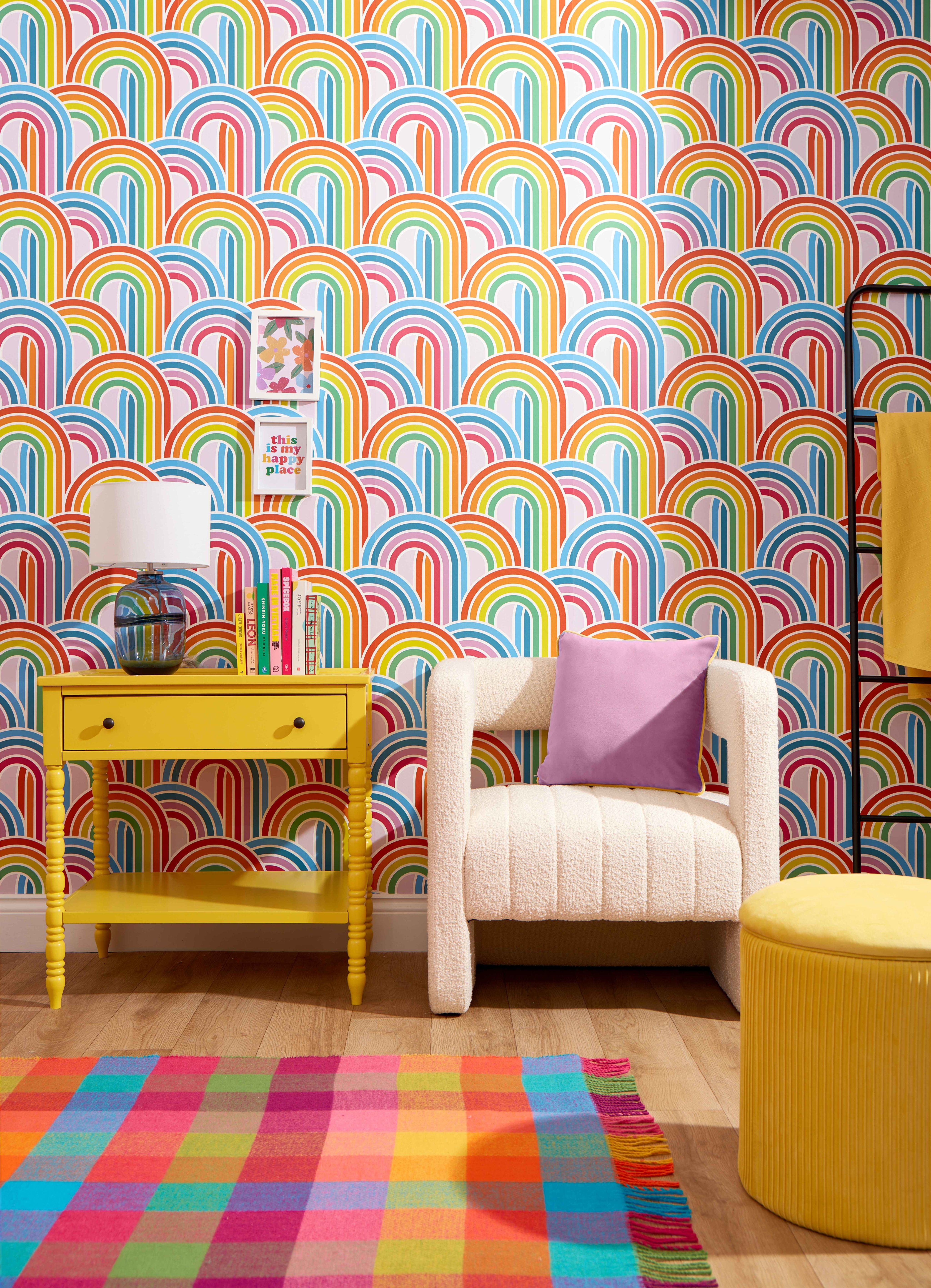 Styled shot of living room with Lust Home rainbow wallpaper